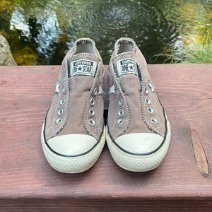 Slip on size 7 women’s Chuck Taylor Converse shoes.